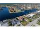 Aerial view showcasing home's location on a canal at 716 Monaco Dr, Punta Gorda, FL 33950