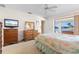 Bedroom with water view and access to patio at 716 Monaco Dr, Punta Gorda, FL 33950