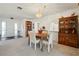 Dining area with a wooden table, chairs, and built-in hutch at 716 Monaco Dr, Punta Gorda, FL 33950