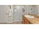 Bathroom with shower, vanity, and walk-in shower at 7325 Mikasa Dr, Punta Gorda, FL 33950