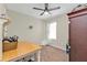 Bedroom featuring a ceiling fan and window at 7325 Mikasa Dr, Punta Gorda, FL 33950