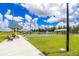 Bocce ball court featuring lakeside view and covered seating area at 7325 Mikasa Dr, Punta Gorda, FL 33950