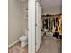 Walk-in closet with shelving and rod for hanging clothes at 7325 Mikasa Dr, Punta Gorda, FL 33950