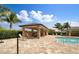 Community pool cabana for relaxation and a refreshing escape from the heat at 7325 Mikasa Dr, Punta Gorda, FL 33950