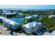 Aerial view of the community showcasing the well-maintained landscaping and waterfront location at 10311 Lands End Cir # 16, Placida, FL 33946
