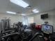 Well-equipped gym with treadmills, elliptical machines, and weightlifting stations at 10311 Lands End Cir # 16, Placida, FL 33946