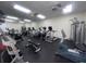 Bright and airy gym with modern equipment and ceiling fans for a comfortable workout at 10311 Lands End Cir # 16, Placida, FL 33946