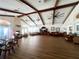 A spacious living room with vaulted ceilings, a fireplace and cozy furniture at 10311 Lands End Cir # 16, Placida, FL 33946