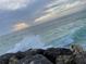 Gulf coast view features rocky breakwater where sky meets the water at 10311 Lands End Cir # 16, Placida, FL 33946