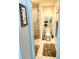 Bathroom featuring a shower, toilet, and storage shelving at 1186 Rio De Janeiro Ave # 106, Punta Gorda, FL 33983