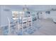 Open concept dining area with bright light, seating for four, and modern decor at 121 Sinclair Se St, Port Charlotte, FL 33952