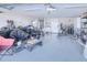 Spacious garage with epoxy floor, storage, and workspace at 121 Sinclair Se St, Port Charlotte, FL 33952