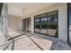 Covered patio with ceiling fan, overlooking the pool at 13356 Rayburn Ln, Port Charlotte, FL 33981