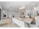Bright dining room with a decorative chandelier and a full view into the kitchen at 13356 Rayburn Ln, Port Charlotte, FL 33981