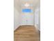 Bright foyer featuring a double door entry, tile floors, transom window, and entry to other parts of the home at 13356 Rayburn Ln, Port Charlotte, FL 33981