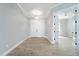 Wide open entry way with views to the front double doors and another room at 13364 Rayburn Ln, Port Charlotte, FL 33981