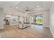 Spacious living room leading to screened patio and pool with lots of natural light at 13364 Rayburn Ln, Port Charlotte, FL 33981