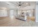 Open-concept living area with seamless flow into a modern kitchen, perfect for entertaining guests at 13364 Rayburn Ln, Port Charlotte, FL 33981