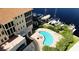 Aerial view of building, boat docks and community pool at 1340 Rock Dove Ct # 143, Punta Gorda, FL 33950