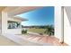 Scenic balcony view overlooking lush landscape with copper roofing on the structure below at 1340 Rock Dove Ct # 143, Punta Gorda, FL 33950