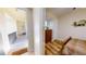 Inviting bedroom showcasing wood floors and a glimpse of the hallway at 1340 Rock Dove Ct # 143, Punta Gorda, FL 33950