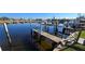 This dock view shows waterfront access with private boat slip for easy access at 1340 Rock Dove Ct # 143, Punta Gorda, FL 33950