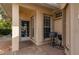Enclosed entrance area with a grill and a decorative storm door with palm tree design at 1706 Fountain View Cir, Venice, FL 34292