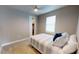 Cozy bedroom featuring soft carpet, a ceiling fan, and a serene atmosphere for restful nights at 17350 Bayharbor Cir, Port Charlotte, FL 33948