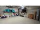 A clean garage with plenty of storage space and room for vehicles and other equipment at 17350 Bayharbor Cir, Port Charlotte, FL 33948