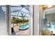 A stunning screened-in pool and spa overlooking a canal, perfect for relaxation and entertainment at 17350 Bayharbor Cir, Port Charlotte, FL 33948