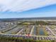 Aerial view of the house and surrounding area, showcasing the neighborhood at 1890 Sunset Preserve Way, Port Charlotte, FL 33953