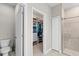 Bathroom with toilet, walk-in closet and shower at 1890 Sunset Preserve Way, Port Charlotte, FL 33953