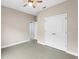 Spacious bedroom with double doors leading to a closet at 1890 Sunset Preserve Way, Port Charlotte, FL 33953
