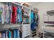 Walk-in closet with shelving and hanging rods at 1890 Sunset Preserve Way, Port Charlotte, FL 33953