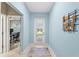 Hallway with access to home office and backyard at 1890 Sunset Preserve Way, Port Charlotte, FL 33953