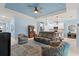 Open living room with kitchen and backyard views at 1890 Sunset Preserve Way, Port Charlotte, FL 33953