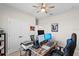 Home office with a desk, two monitors, and printer at 1890 Sunset Preserve Way, Port Charlotte, FL 33953