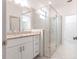 Bathroom featuring granite counters, and a modern glass enclosed shower at 1912 Saddlewood Cir, Port Charlotte, FL 33953