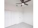 Bright bedroom with ample closet space and neutral tones at 1912 Saddlewood Cir, Port Charlotte, FL 33953