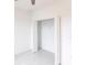 Bright and airy walk-in closet with ample storage shelving at 1912 Saddlewood Cir, Port Charlotte, FL 33953