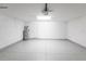Spacious two-car garage with clean flooring at 1912 Saddlewood Cir, Port Charlotte, FL 33953