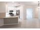 Bright kitchen features tile flooring, stainless steel appliances, and recessed lighting at 1912 Saddlewood Cir, Port Charlotte, FL 33953
