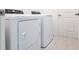 Laundry room features white washer and dryer at 1912 Saddlewood Cir, Port Charlotte, FL 33953