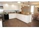 Eat-in kitchen features granite countertops, stainless steel dishwasher, and ample cabinet space at 21535 Edgewater Dr, Port Charlotte, FL 33952