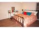 Comfortable main bedroom with patterned bedding and dresser at 21535 Edgewater Dr, Port Charlotte, FL 33952