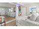 Comfortable seating area with seamless access to the kitchen and a view of the front entrance at 21923 Cellini Ave, Port Charlotte, FL 33952