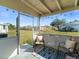 Covered patio with seating area, perfect for enjoying the outdoors at 21923 Cellini Ave, Port Charlotte, FL 33952