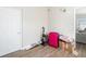 Unfurnished room featuring wood floors and ample natural light, ready for your personal touch at 21923 Cellini Ave, Port Charlotte, FL 33952