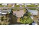 This home is nestled in a well-maintained neighborhood with mature landscaping, and a screened-in patio at 2443 Lake View Blvd, Port Charlotte, FL 33948
