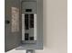 Electrical panel showcasing circuit breakers, wiring, and organized electrical components for easy maintenance at 2443 Lake View Blvd, Port Charlotte, FL 33948